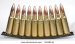 stock-photo-a-single-clip-of-x-caliber-ammunition-31058146.jpg